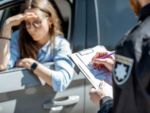 woman being pulled over for traffic violation